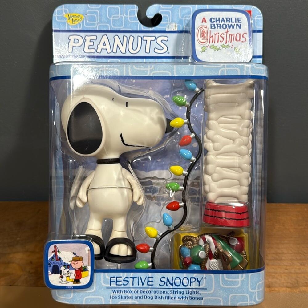 A Charlie Brown Christmas 2004 PEANUTS Festive Snoopy with decor, lights, skates